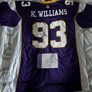 K. Williams signed jersey new with tags. NFL size XL